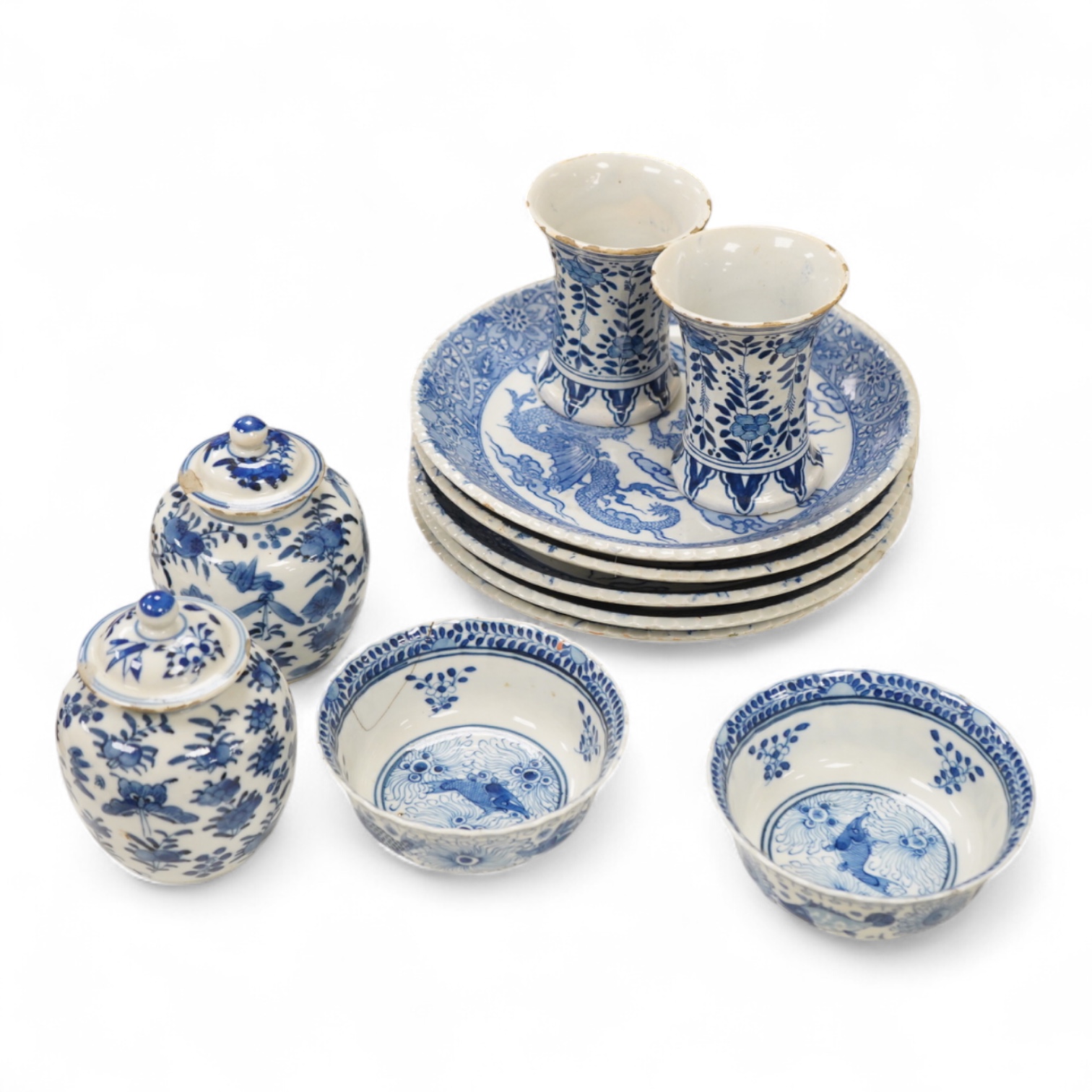 Group of blue and white Chinese porcelain and pottery to include dragon dishes and a pair of fish bowls, together with a pair of tin glazed vases, largest 21cm in diameter